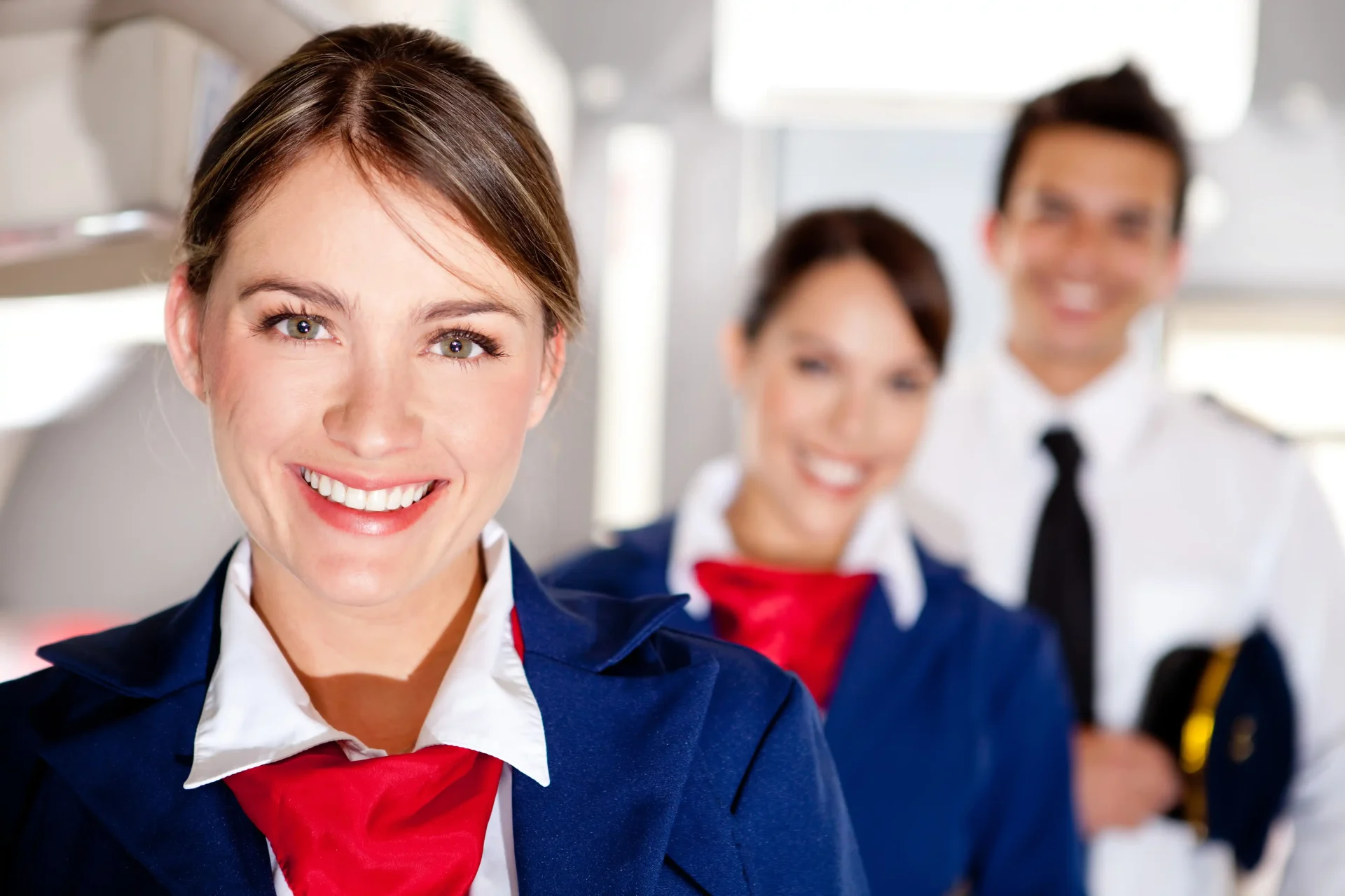 Flight Attendant Interview Preparation Flight attendants and airline pilot representing flight attendant interview preparation